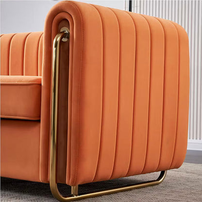 Gold-tone side-frame accent on the orange sofa