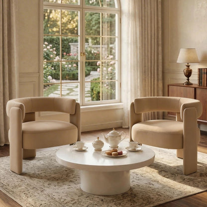 Beige Cutout-Back Velvet Accent Chair — two beige chairs arranged around a coffee table