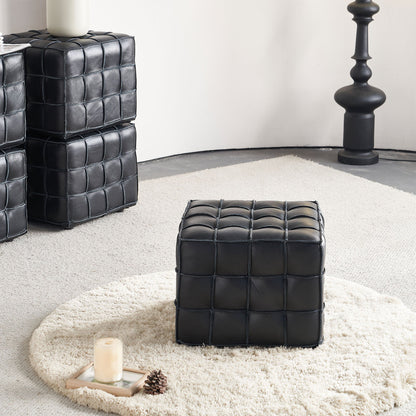 Square Tufted Ottoman — black ottoman viewed from farther away