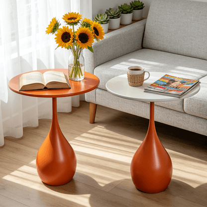 Orange and white-top side tables together