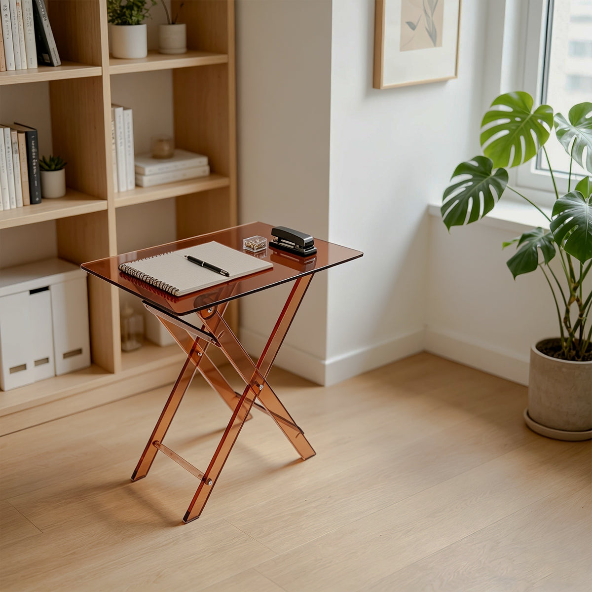 Brown acrylic X-leg side table used beside indoor shelving