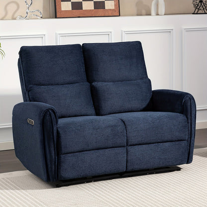 Blue two-seat power reclining loveseat with padded arms and lumbar cushions in a living room.