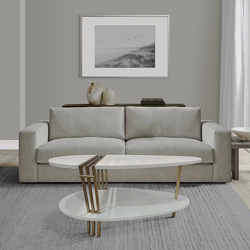 White oval coffee table by sofa