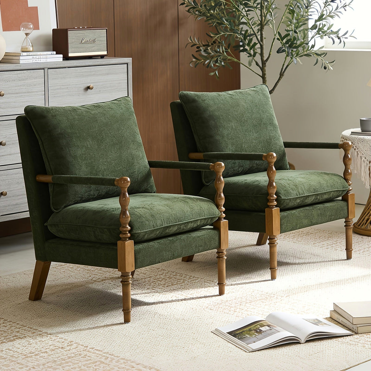 Green upholstered accent chair with turned wood front posts
