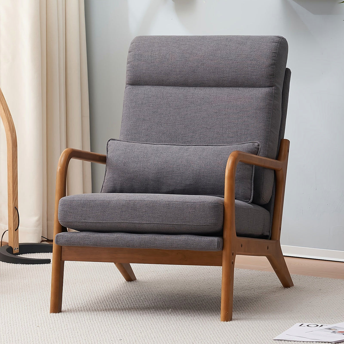Dark gray linen high back upholstered lounge chair with a warm wood frame