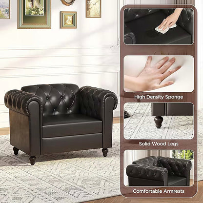 Black faux leather Chesterfield club chair with rolled arms and turned wood feet