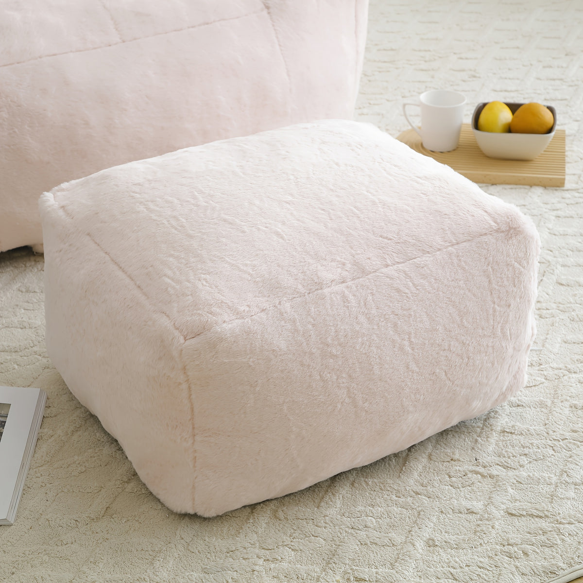 Seashell Faux Fur Lounge Chair with Footrest — matching footrest close-up.