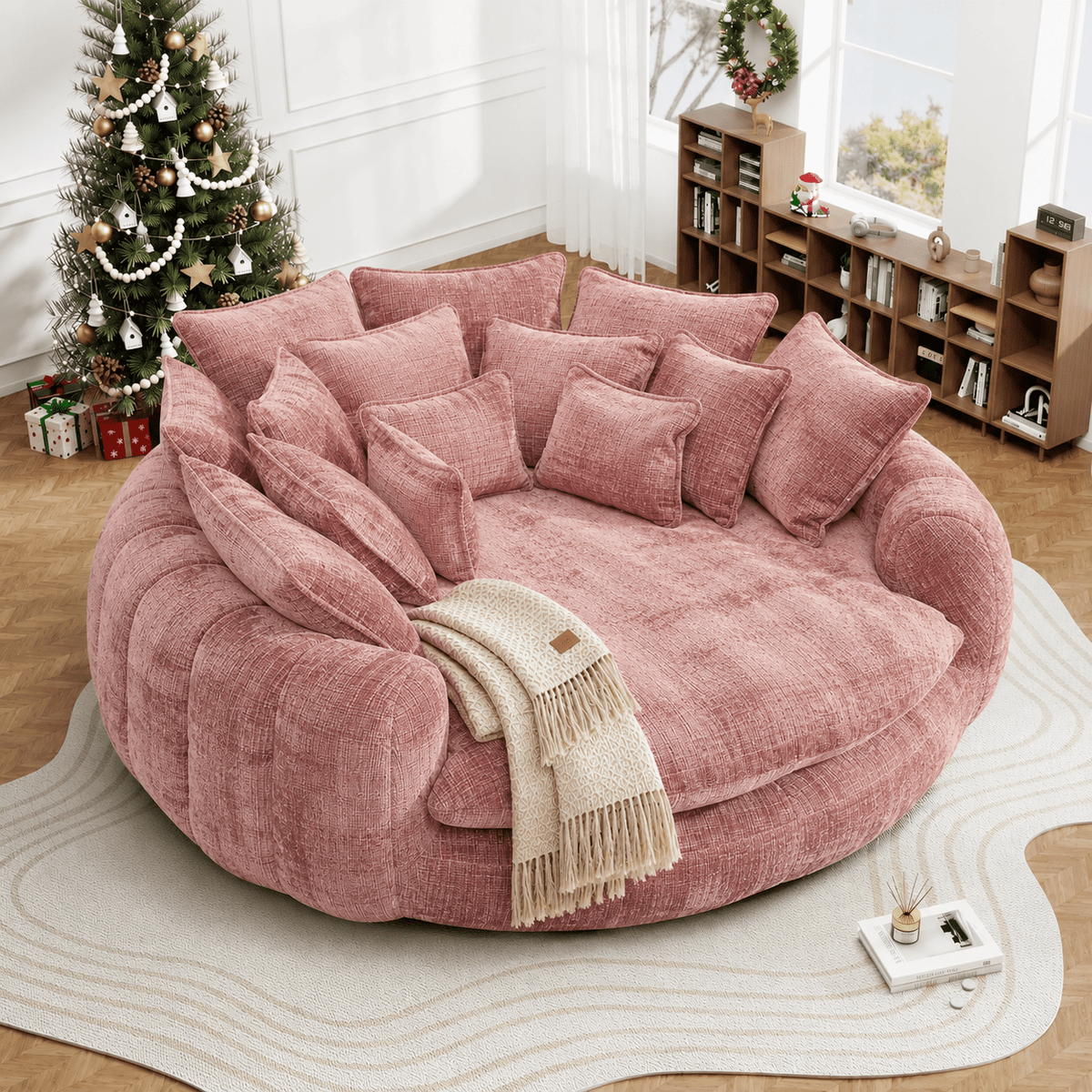 Oversized Round Chenille Lounge Sofa — pink upholstery in a holiday-styled living room.