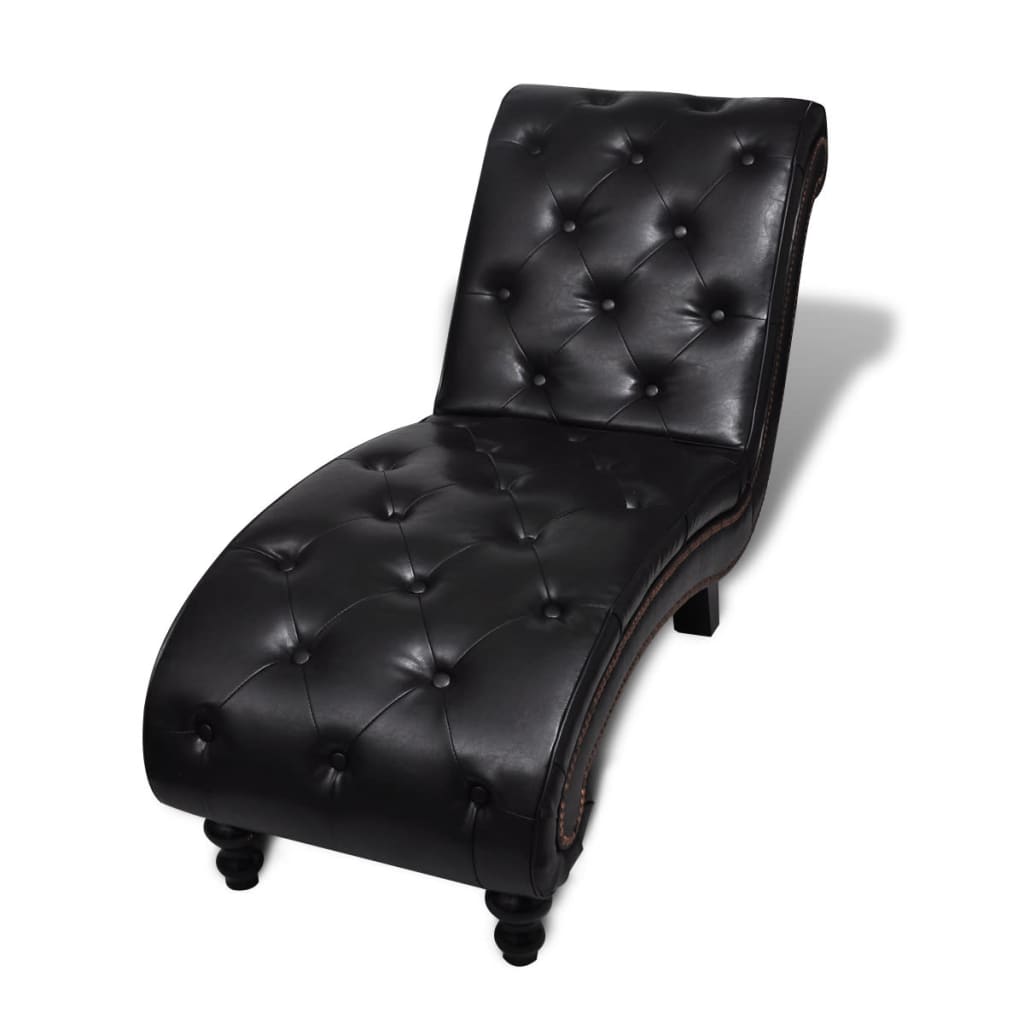 Front angled view of the dark leather-look chaise with a tufted extended seat and raised back.