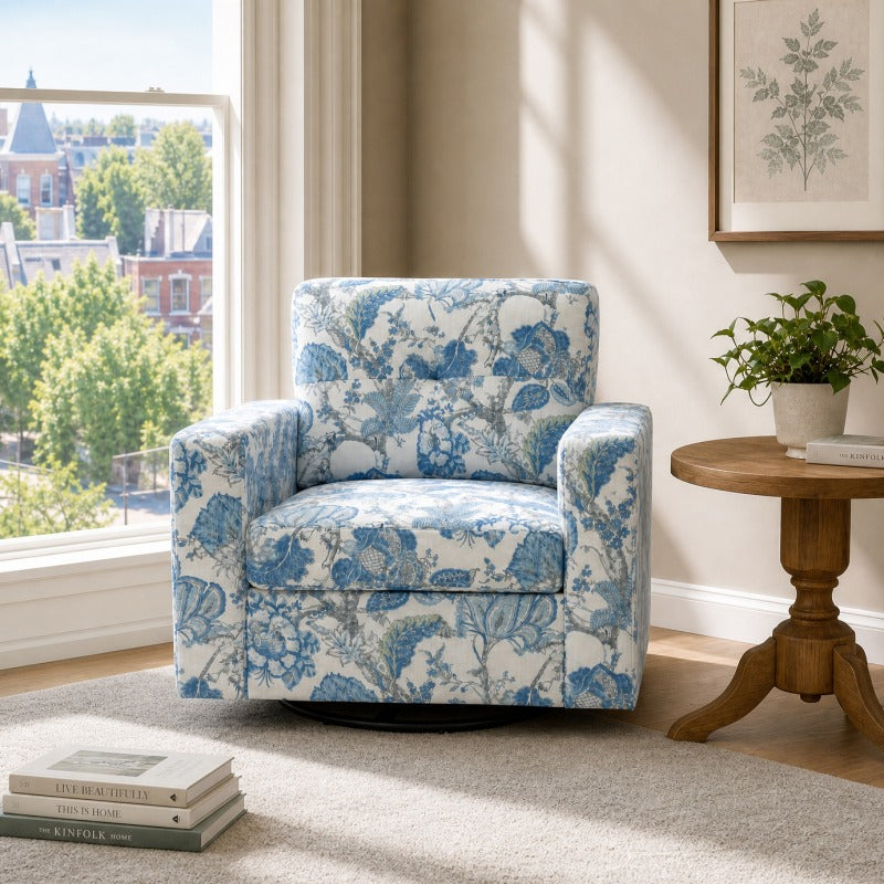Blue Botanical Swivel Accent Chair — angled chair view in a living room.