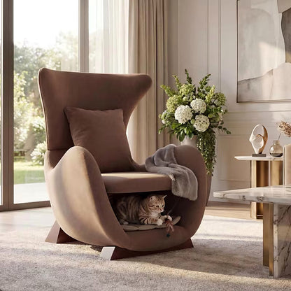 Brown sculptural upholstered accent chair with a curved wood frame and lower storage nook