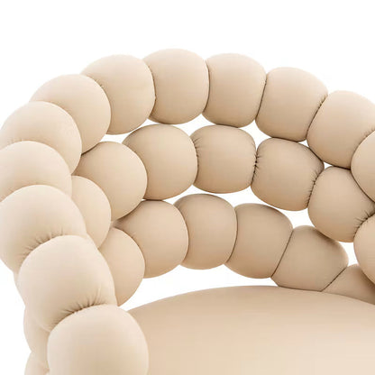 Beige bubble velvet bar stool with a gold tone base — bubble velvet texture detail