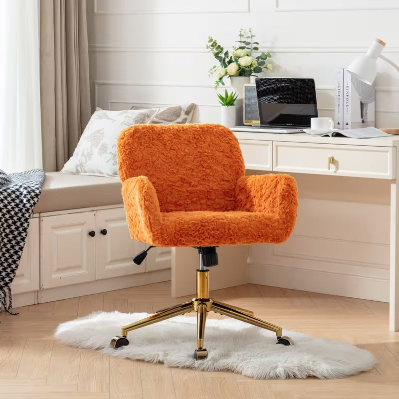Front view of the orange faux alpaca chair at a desk