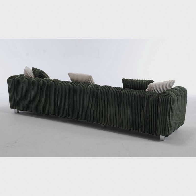 Rear studio view of the green ribbed sectional sofa