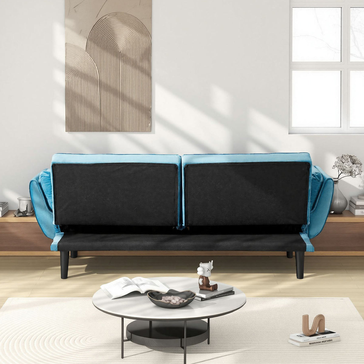 Blue Tufted Convertible Sofa — rear view showing adjustable back panels.