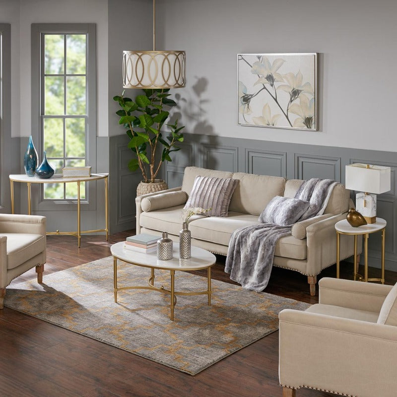 Coordinated living room showing the Bordeaux console beside a sofa and matching accent tables