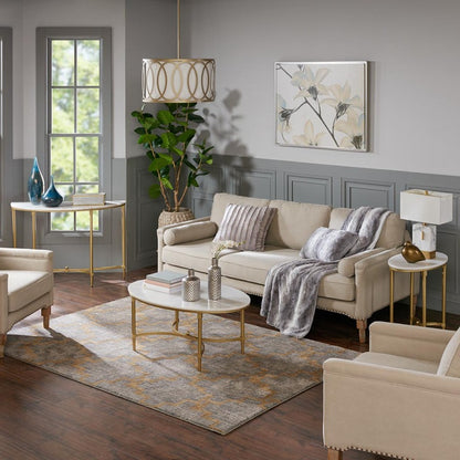 Coordinated living room showing the Bordeaux console beside a sofa and matching accent tables