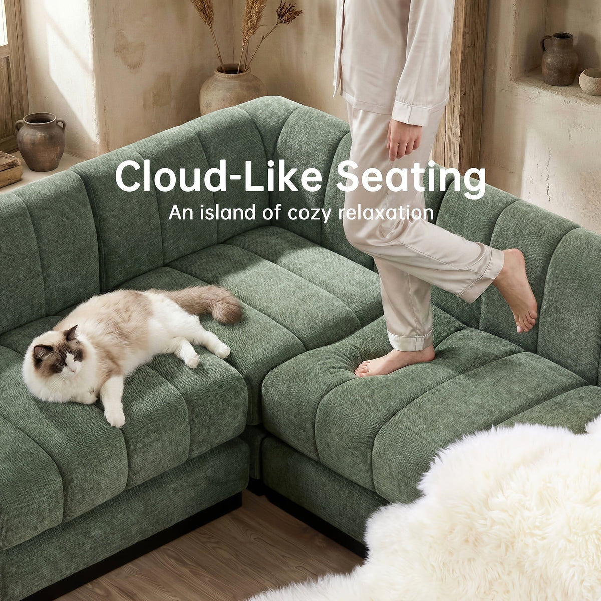 Green sectional seat and corner cushions shown with a standing person and a resting cat.