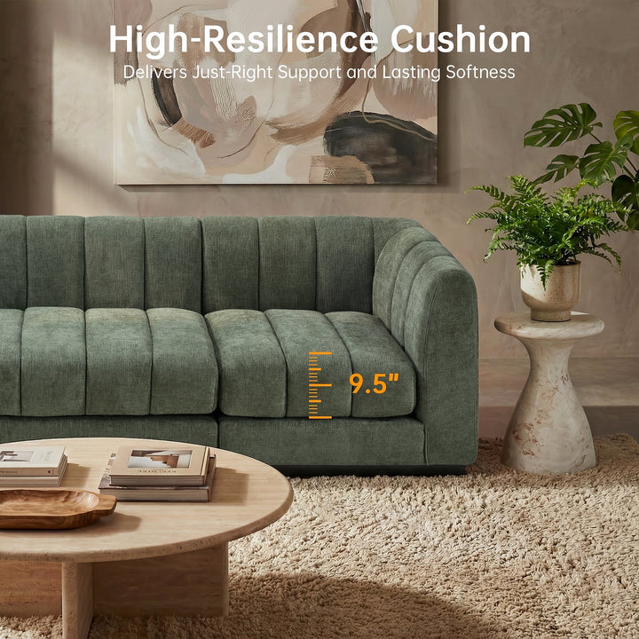 Close-up of the green sectional’s channelled seat cushions and arm, with a cushion-thickness annotation.