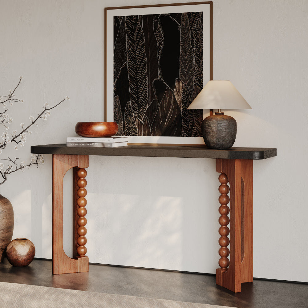 Front room view of the two-tone console showing rows of spherical beads inside both supports.