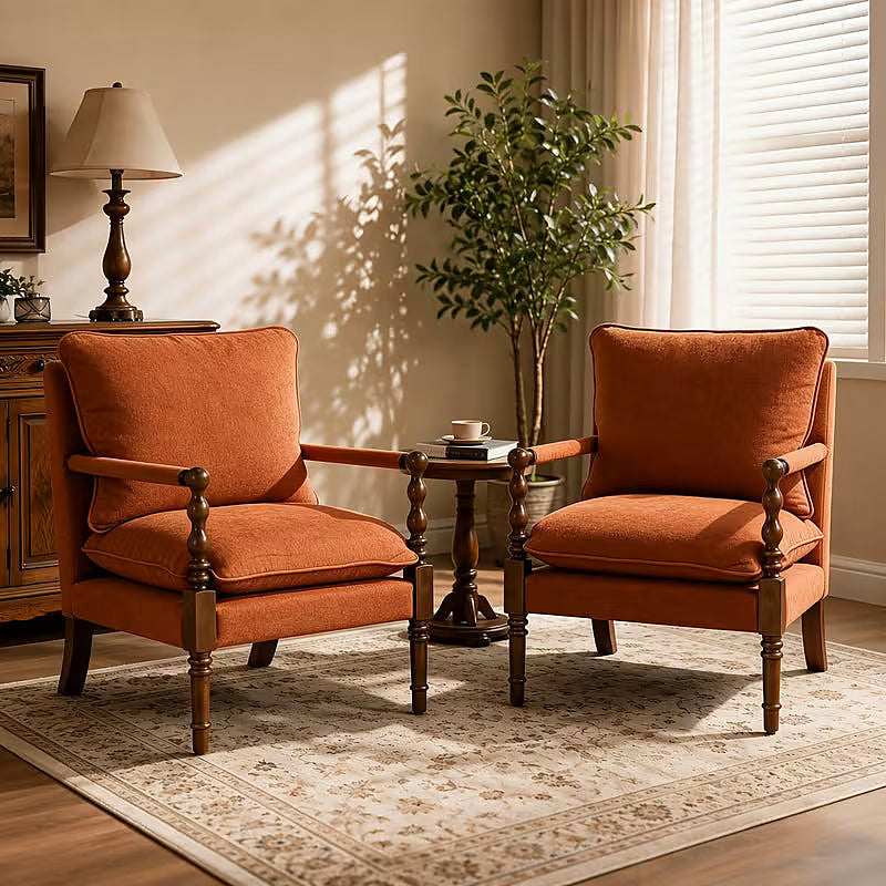 Orange upholstered accent chair with turned wood front posts