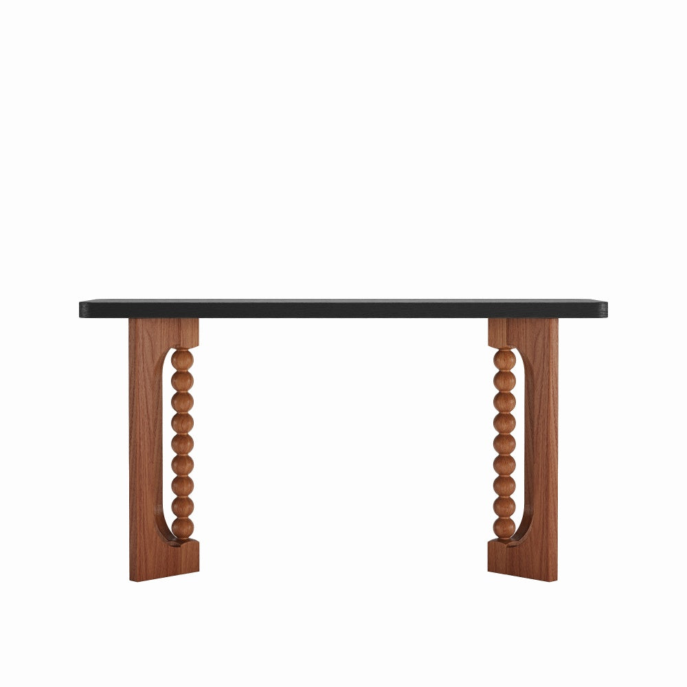 Front isolated view of the console showing its dark rectangular top and sculptural supports.