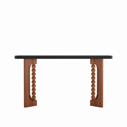 Front isolated view of the console showing its dark rectangular top and sculptural supports.