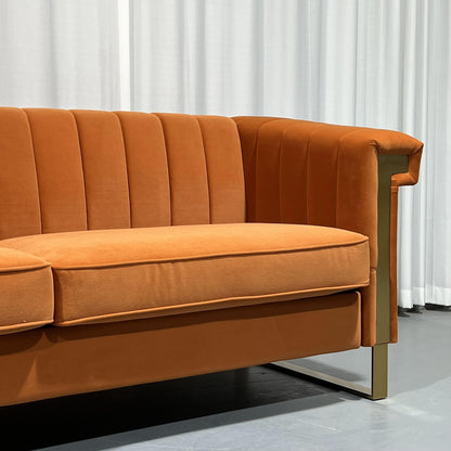 Orange Channel-Tufted Velvet Sofa — seat cushions and tufted back detail.