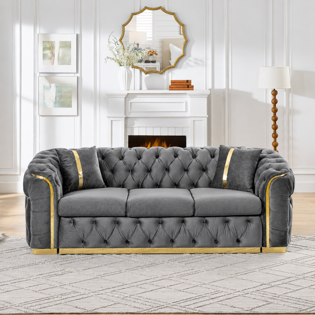 Velvet Chesterfield Sofa with Gold-Tone Trim — grey sofa with gold-tone trim in a living room.