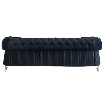 Straight rear view of the black tufted Chesterfield sofa