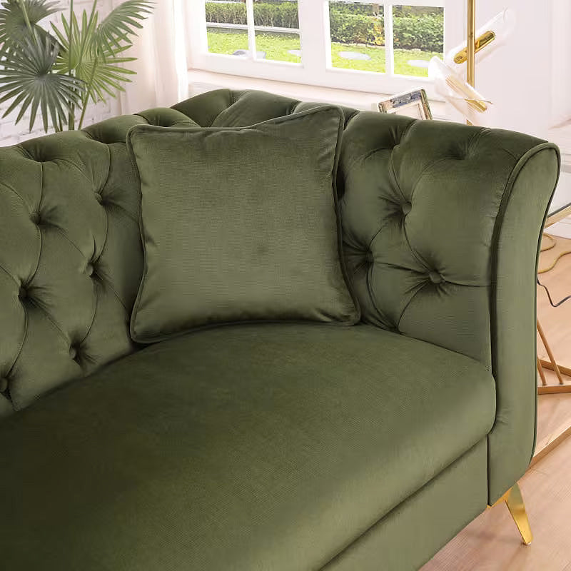 Close-up of the Stanford sofa tufted back, curved arm and square pillow