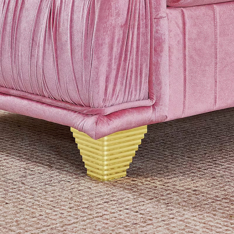 Aurelia loveseat, close-up of stepped gold-tone leg