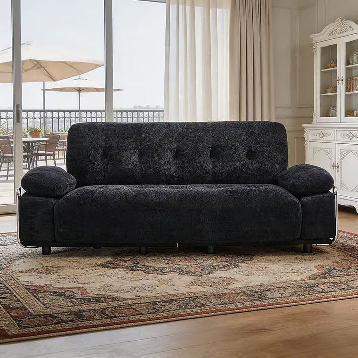 Alden black tufted sofa, straight-on room view