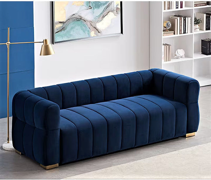 Soren blue channel-tufted sofa, elevated room view