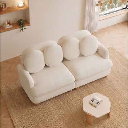 Clover beige loveseat, elevated angled view