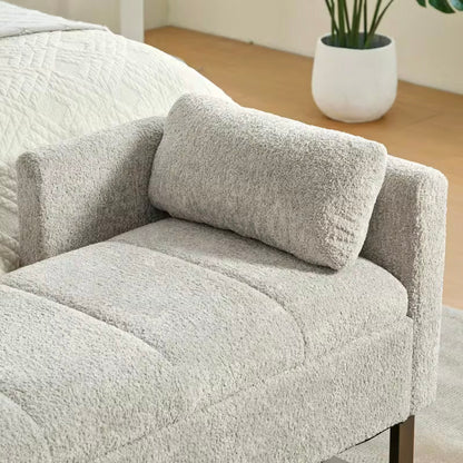 Close view of a matching rectangular pillow placed beside the padded arm
