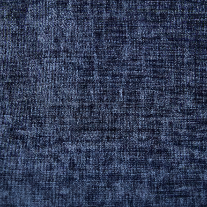 Close view of the navy blue upholstery texture