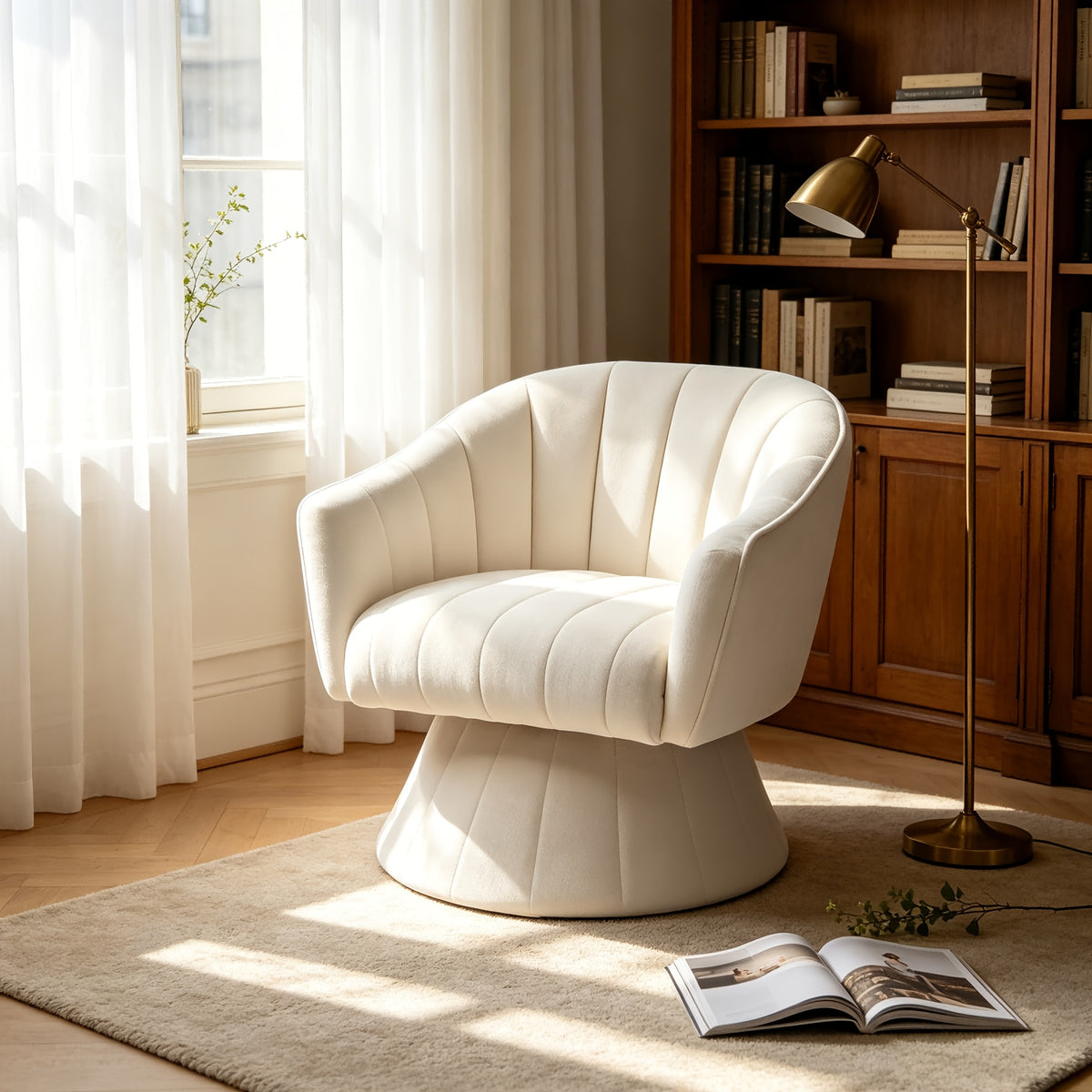 Channel-Tufted Swivel Barrel Chair — cream chair beside a window