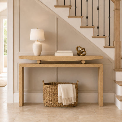 Natural wood veneer console with raised floating-style top beneath a staircase