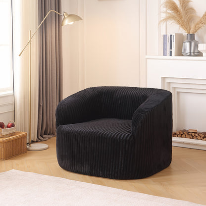Rounded Foam Lounge Chair — black ribbed upholstery option.