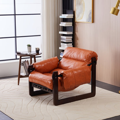 Leather-Look Accent Chair with Wood Frame — retro orange chair with dark wood frame in a room