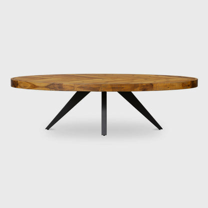Front view of the oval herringbone coffee table with black splayed legs