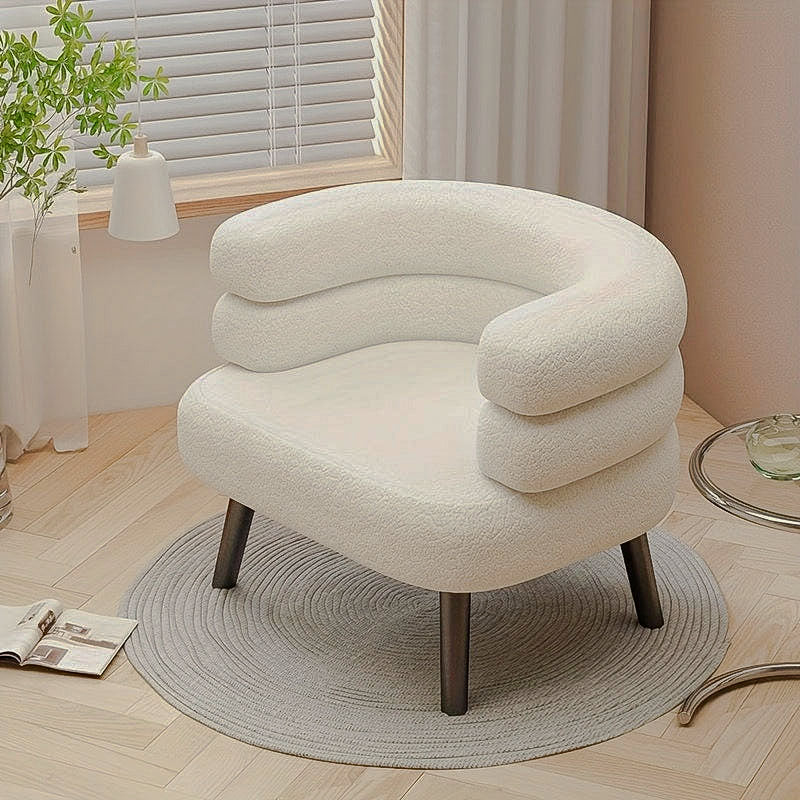 Cream Layered-Back Accent Chair — cream layered-back chair in a bright room