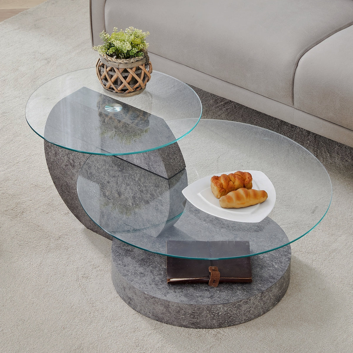 Gray disc-base glass table