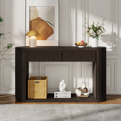Espresso fluted console with closed drawers, a lamp and flowers in a living space