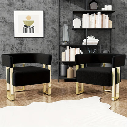Cutout-Back Accent Chair with Gold-Tone Base — two black chairs in a dark room