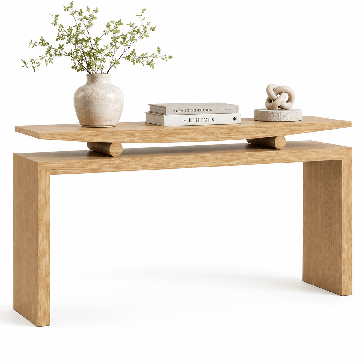 Natural wood console styled with a vase and books, showing the open rectangular frame