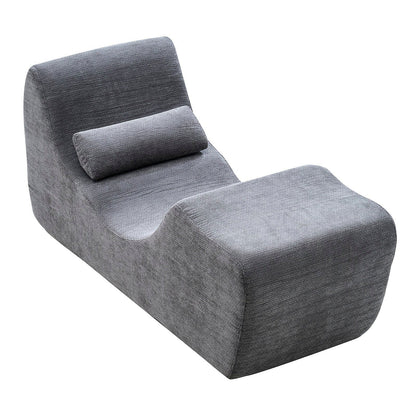 Gray fabric foam yoga chaise with a lumbar pillow