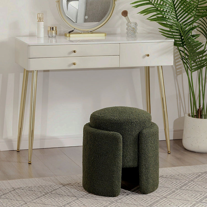 Green sculptural textured vanity stool with round top at a dressing table