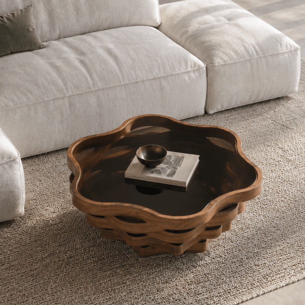 Overhead angled view of the cloud-shaped glass-top table and layered wave base